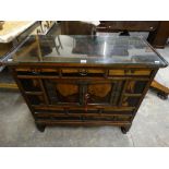 An Oriental Fruitwood Multi Drawer Side cabinet