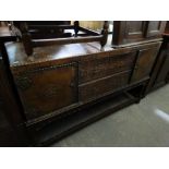 An Early 20th Century Oak Dinning Room Sideboard, Upholstered In Leather