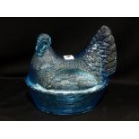 A Moulded Blue Glass Hen On Nest