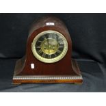 A Polished Mahogany Encased Mantel Clock With Circular Dial