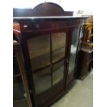 An Edwardian Mahogany Bow Front Two Door Display Cabinet