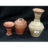 Two Circular Based Early Terracotta Narrow Necked Vases With Stylised Bands