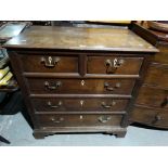 An Antique Oak Chest Of Two Short And Three Long Drawers, On Bracket Feet