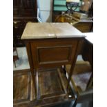 An Edwardian Mahogany Lift Top Work Table With Fitted Interior