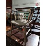 A Spindle Backed Smokers Bow Type Chair