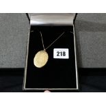 A 9ct Gold Locket And Chain