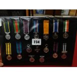 A Group Of 16 Miniature British Medals