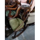 A Victorian Period Splat Back Rocking Chair