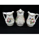 A Group Of Three Floral Decorated Staffordshire Pottery Marriage Jugs