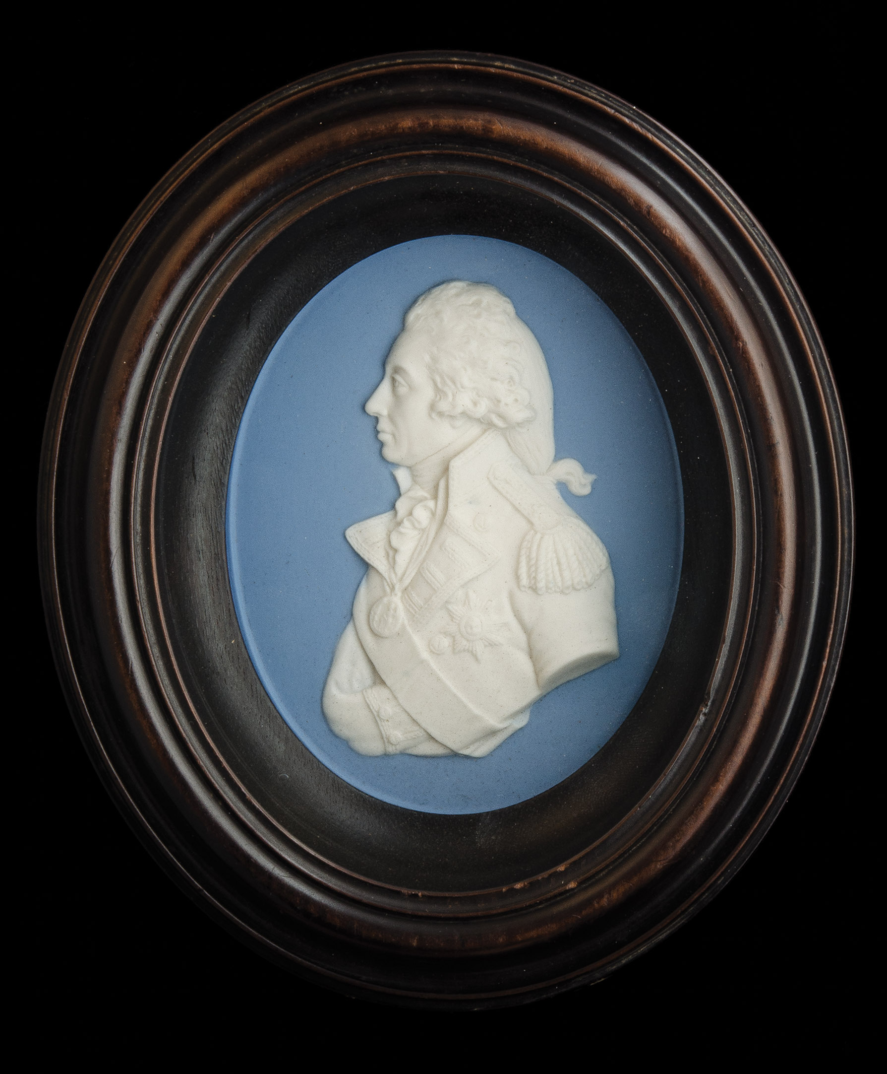 *A Blue Jasperware Portrait Plaque of Lord Nelson, by Wedgwood, modelled by Jan De Vaere, in a