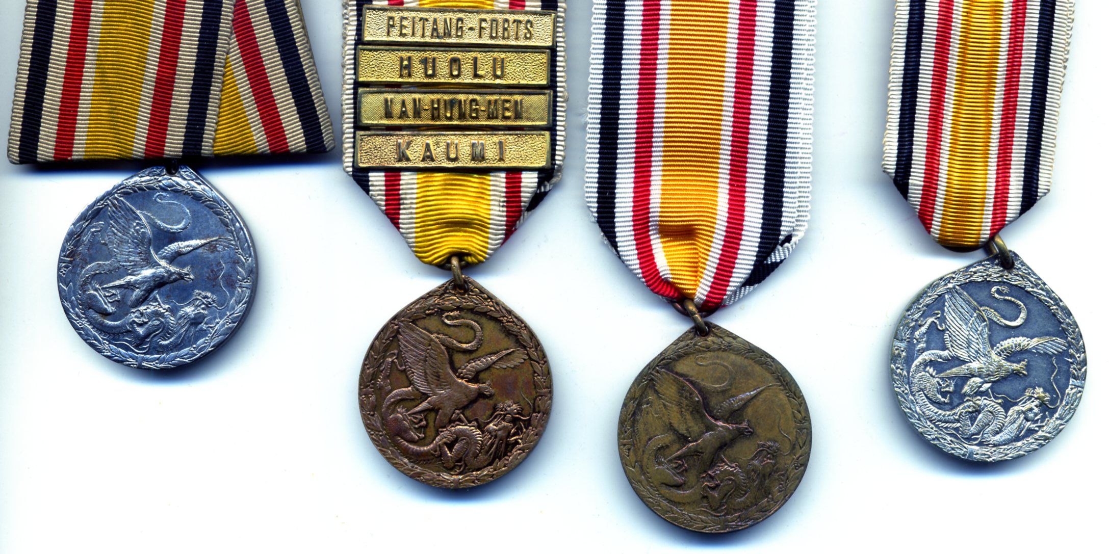 Germany, China Campaign Medal, 1900-1901, combatant’s medal in bronze (2), the first with 4 attached