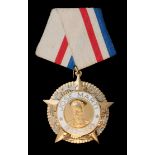 *Cuba, Order of Jose Marti, post 1979, breast badge, in silver gilt and white enamel, 43.5mm, in