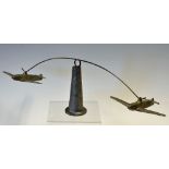 Interesting War-Time Austerity Toy Roundabout cast from recycled white metal. Two Spitfire-type