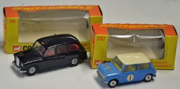 Corgi Toys Austin London Taxi No.418 whizzwheels, black in original box, slight marks throughout,