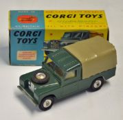 Corgi Toys Land Rover 109 WB No.438 green with tan hood (missing corner) in original box, with