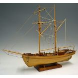 Wooden Schooner Model Ship a finely made quality model, in wood, 27inches in length, c/w stand in