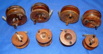 REELS: (8) Collection of eight Nottingham spine back reels, sizes 2.5" to 4", 3 with ratchet checks,