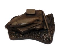 BRONZE: David Hughes sculpture cast bronze effect paper weight, 4.5"x3", showing rod, reel, priest