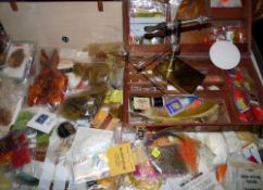 FLY TYING & PRO VICE: A large collection of fly tying material, furs, feathers, silks tinsel dubbing
