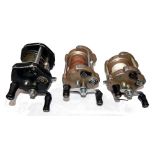 REELS: (3) Set of three JW Young Gildex hinged feet bait casting multiplier reels, a black finish