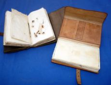 WALLETS: (2) Two leather trout fly wallets, one by Hardy, bearing an ink date of 1896, containing