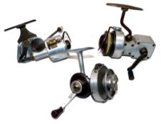 REELS: (3) Three unusual scratch or engineered built fixed spool spinning reels, fully encased model