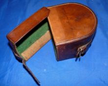 REEL CASE: Block leather D shaped reel case with green baize lining, original strap/buckle, and