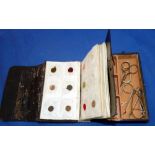WALLET: Black leather fly tyer's wallet containing fly tying tools and materials, seals fur