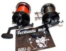 REELS: (2) Abu Ambassadeur 9000CL automatic 2 speed multiplier reel, foot stamp 84-290-91, star