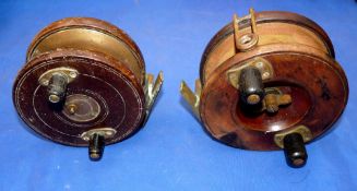 REELS: (2) Pair of large mahogany/brass Nottingham star back sea reels, a 5.6" diameter model with