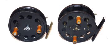 REELS: (2) Pair of Speedia 4" alloy trotting reels, narrow and wide drum models, both with amber