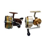 REELS: (2) Seamartin large tournament style fixed spool casting reel with unusual geared rod line