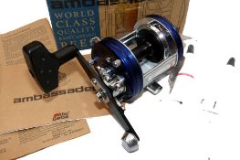 REEL: Abu Ambassadeur 6500 C3CT Elite, blue finish grooved end plates, foot stamp 050007, single