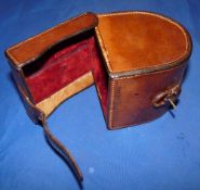 REEL CASE: C Farlow 191 Strand London block leather D shaped reel case with red baize lining,