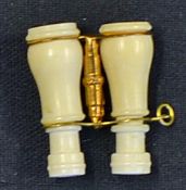 Ireland Pair of Miniature Binoculars made of Bone with small engraved view of tourist spot in