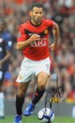 Manchester United Ryan Giggs signed colour print in red strip, signed in ink, overall 35.5 x 45.5cm,