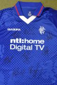 Signed 2002-2003 Rangers football shirt signed by squad players such as Lovenkrands, Ferguson, De