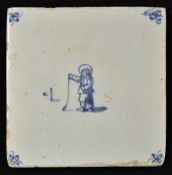 Dutch Delft Kolfing Scene Tile in blue and white with decorative floral design to the corners with