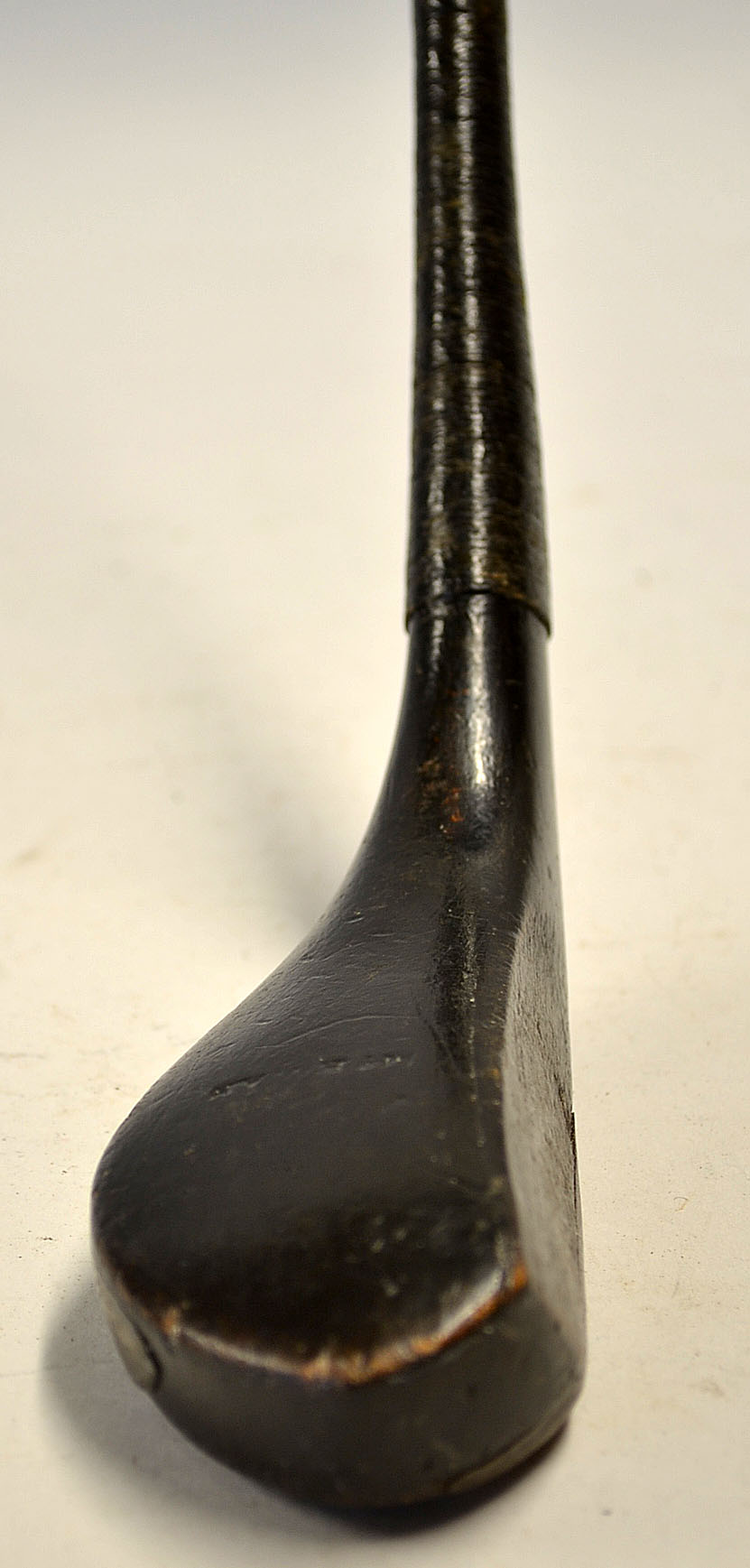 Early McEwan dark stained longnose beech wood hooked face grass driver c.1865 - the head measures