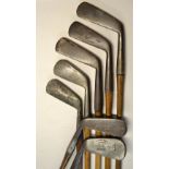 7x Various irons to include 2 left hand irons a mashie and a jigger, 4 smooth faced long irons et al