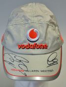 Formula One Lewis Hamilton and Jenson Button Signed baseball cap Official McLaren Merchandise signed