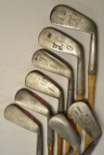 8x Assorted irons including an R Forgan Maxwell model with flanged sole having a clear shaft