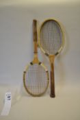 A W Gammage Ltd London elongated oval head wooden tennis racket with convex wedge, red and plain