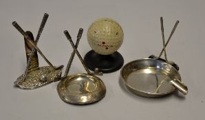 Golf Menu Holders a Penfold golf ball, silver crossed clubs and ball London 1925 with embossed