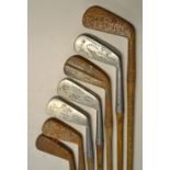 7x Assorted long irons 3x stainless including George Duncan 'Akros' model showing the Gibson star