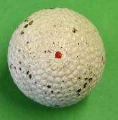 The Hopper bramble patent gutty golf ball retaining most of its original white paint, with a central