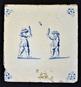 Battledore: rare Delft blue and white tile c.1660 - with decorative floral corners and 2 men playing