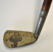 Interesting Sunday golf walking stick-fitted with a golf club iron head handle with flanged sole and