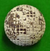 The Silver Town large moulded mesh lined gutty golf ball - retaining most of the original white