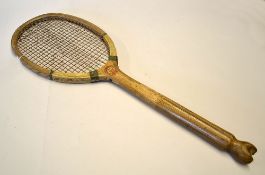 A Empress wooden fishtail tennis racket-fitted with a concave wedge, red and plain double centre